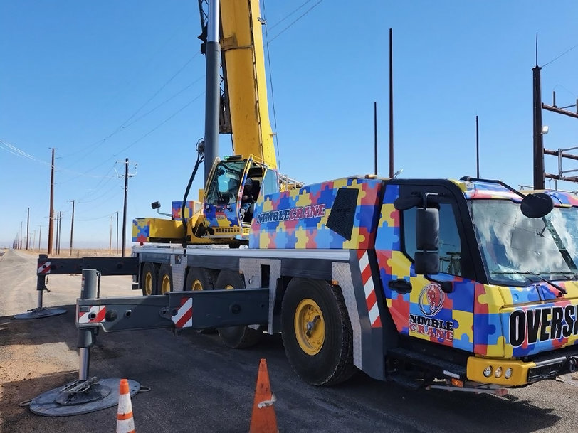 Manitowoc: Nimble Crane to shine light on Autism Awareness Month with vibrant crane wrap